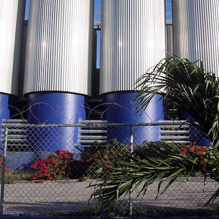 Barbed wire on top of chain-link fence